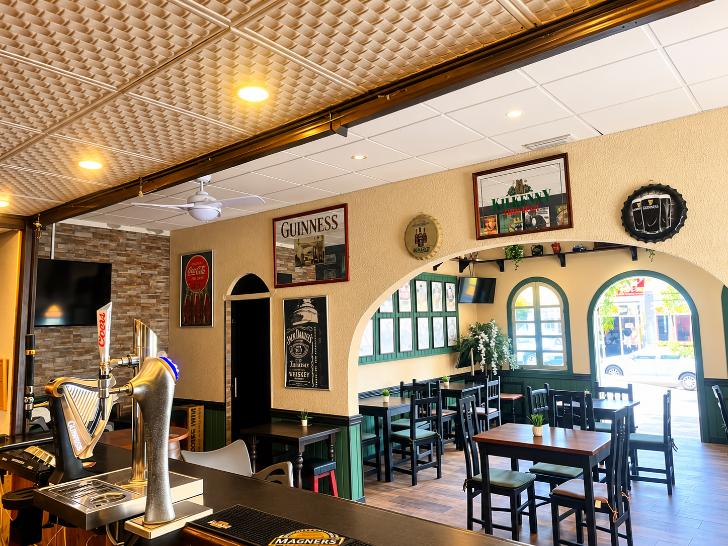 Wide view across the bar and seating inside The Irish Table
