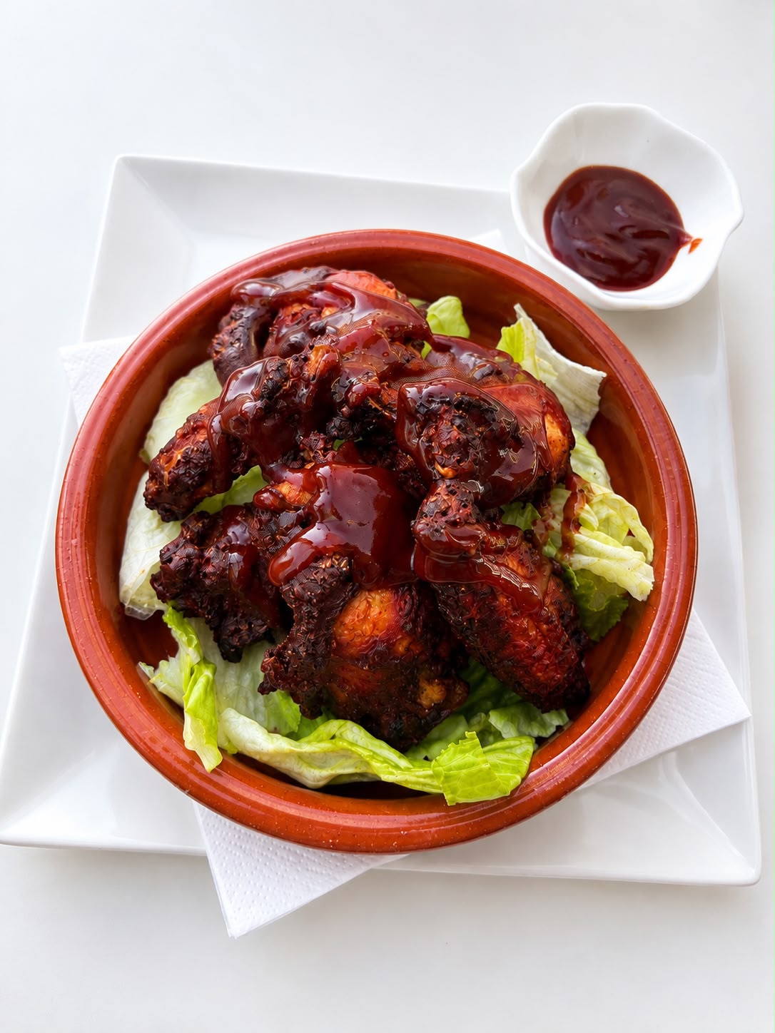 Hot and BBQ buffalo wings with dipping sauce